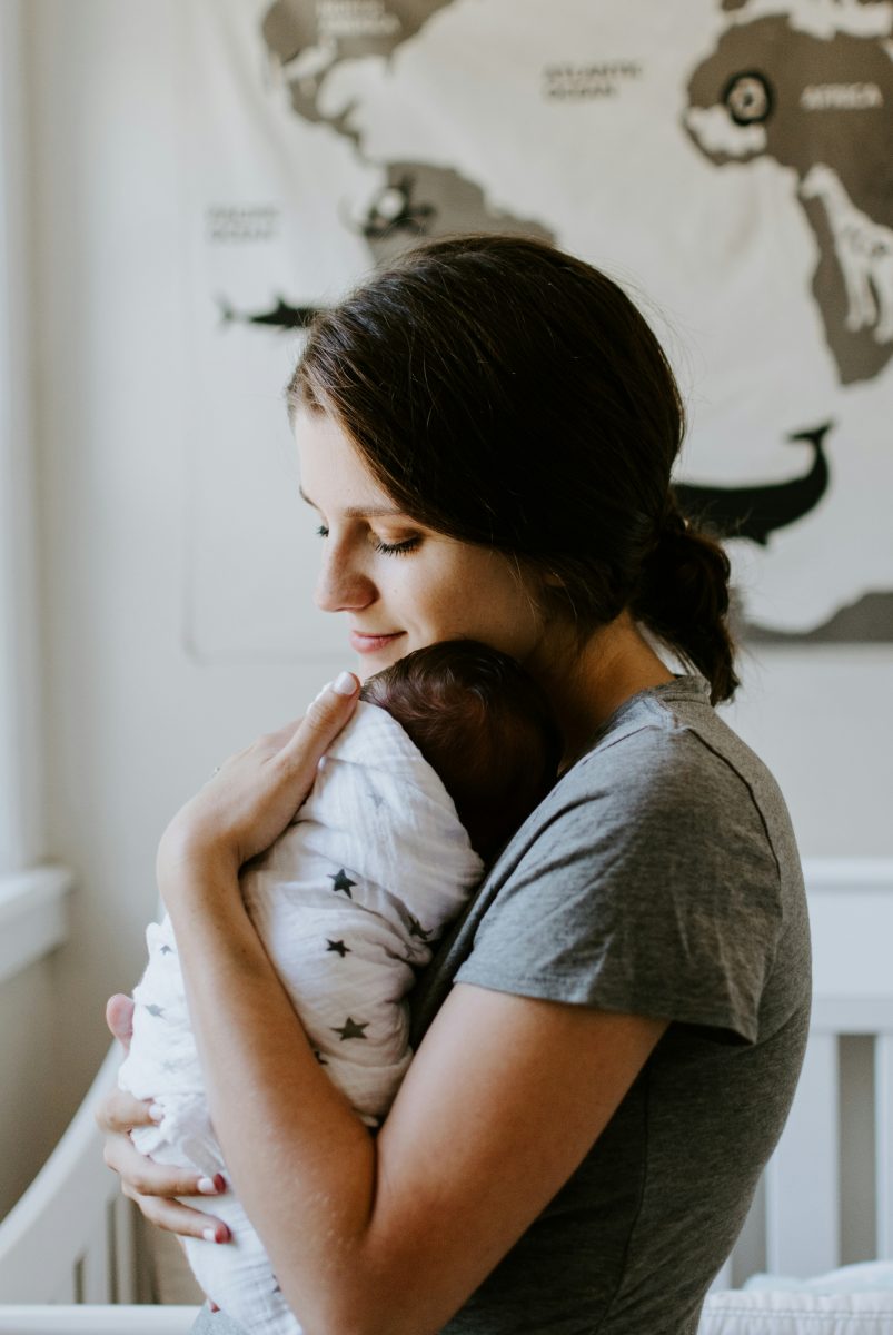 Mother holding her newborn baby
